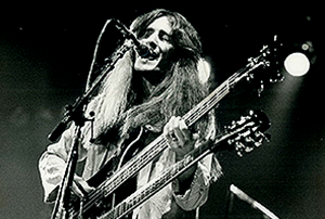 Geddy playing a doubleneck bass